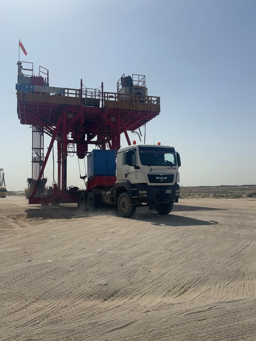 MAN prime mover hauling a rig substructure