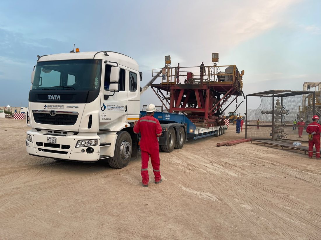 Pilot vehicle escorting an oversize load convoy